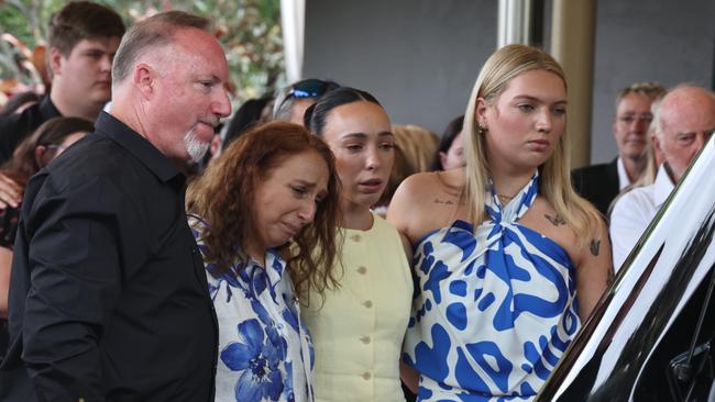 Family members say their goodbyes at Cameron Duce’s funeral at Allambie Memorial Park on the Gold Coast. Pictured are Chris, Sonia, Tayla and Brianna. Picture: Glenn Hampson