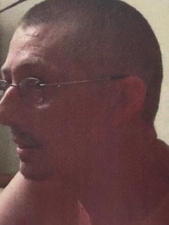 Rodney Scarman, 52, was found dead inside the electrical cupboard of a unit block on Walker St, Waterloo on Boxing Day 2011..