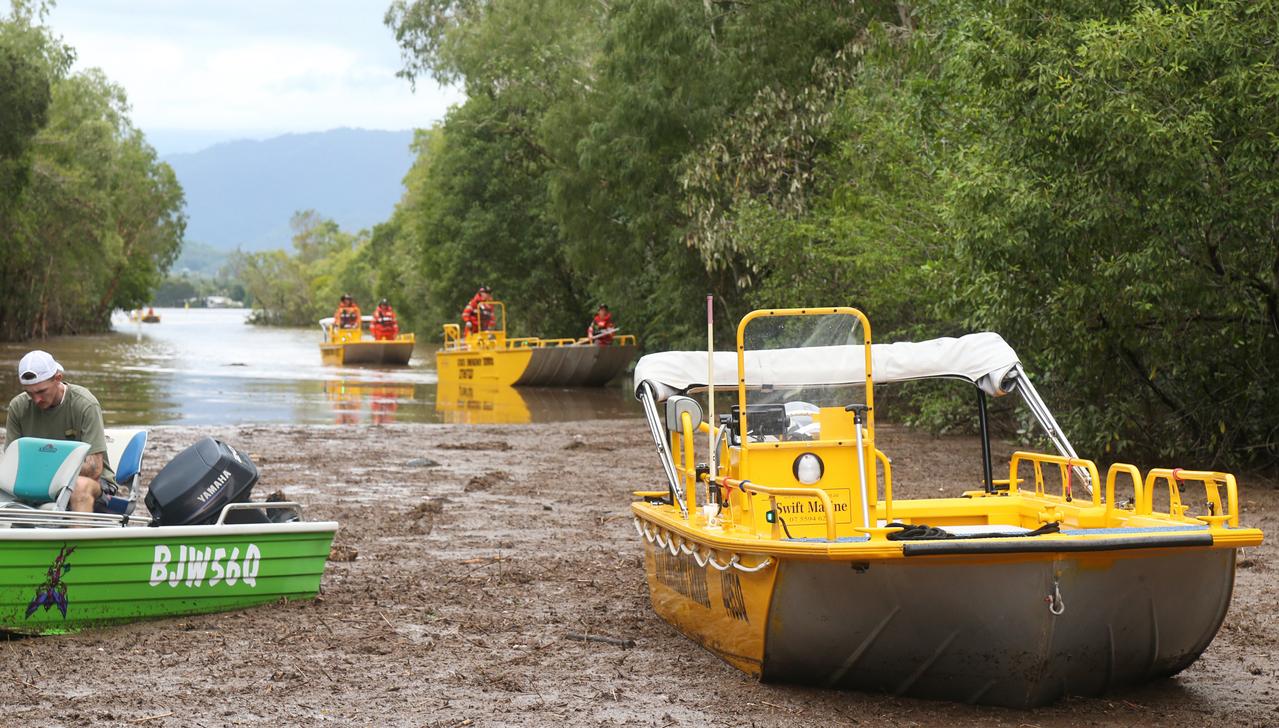 SES boats muster in Holloways Beach, ready for emergency response amid rising floodwaters. Picture: Peter Carruthers