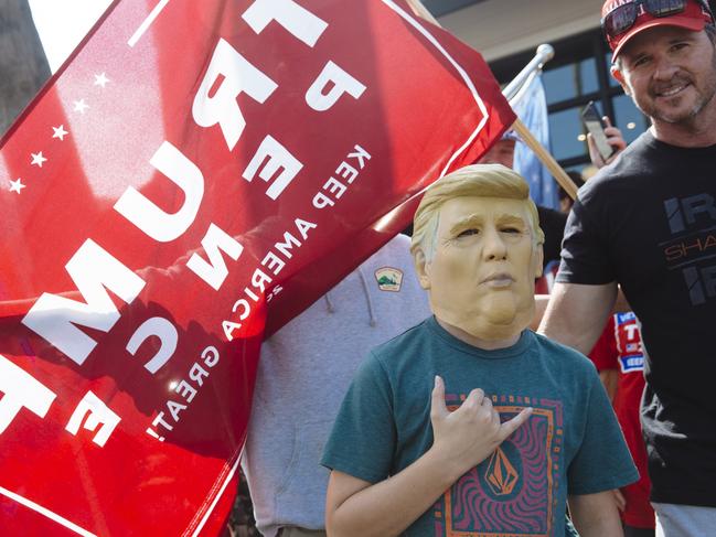 Trump supporters lined the streets, wearing MAGA gear. Picture: Angus Mordant for News Corp Australia