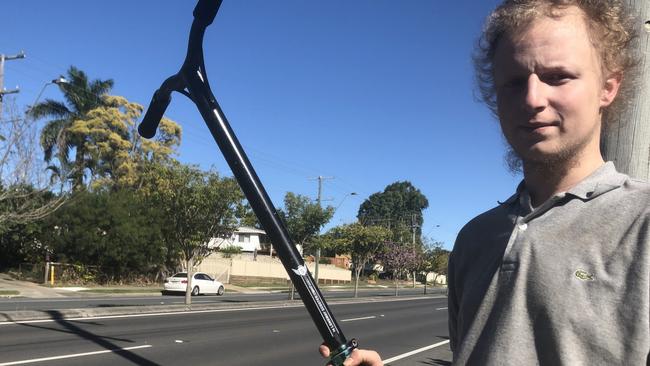 Marsden scooter rider Zach Burgess on the busy Browns Plains Rd where a 14-year-old boy was hit by a car last week.