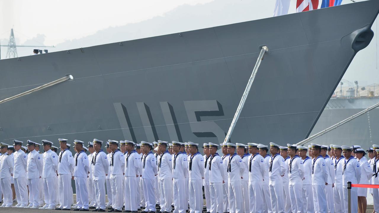 Taiwan sailors parade in front of the Feng Chia (1115) navy frigate in 2018. Picture: Chris Stowers/AFP