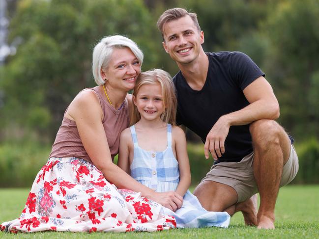 Ukrainian refugees Oleksandr Trukhin, his wife Maryna Lialka, with their daughter Viktoriia, six, are looking forward to Australia Day this year. Picture: David Swift