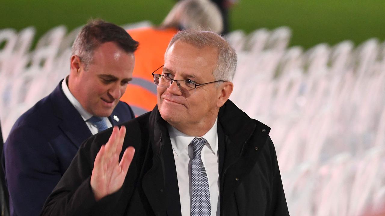 Australian Prime Minister Scott Morrison waves as he leave after the state memorial service. Picture: William West / AFP