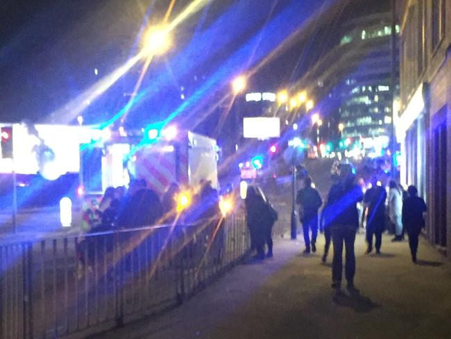 People vacate Manchester Arena. Picture: AFP