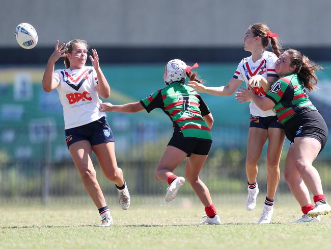 A mad scramble for the loose ball. Picture: Sue Graham