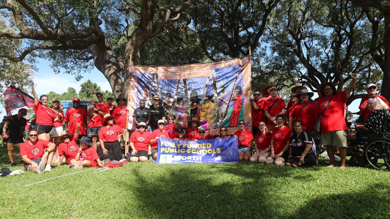Australian Education Union members marched through Darwin for the annual May Day march, celebrating union victories including the eight-hour work week, on Monday, May 5. Picture: Zizi Averill