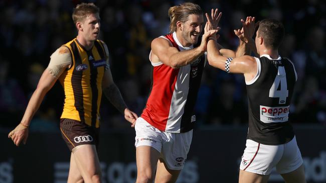 Josh Bruce and Jade Gresham celebrate a St Kilda goal.