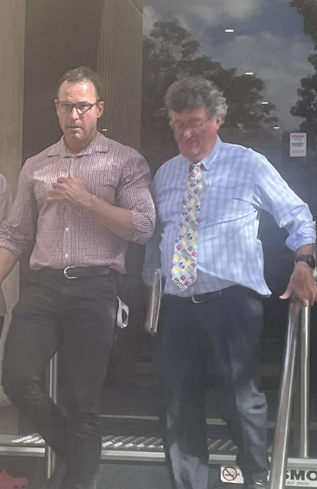 Yipirinya School principal Gavin Morris leaves Alice Springs Local Court with lawyer John Stirk after pleading guilty to employing unregistered teachers on May 15 2024.