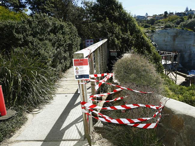 Waverley Council have installed hoarding and temporary fencing on either side of the Diamond Bay walk after a woman fell from to her death. Picture: John Appleyard