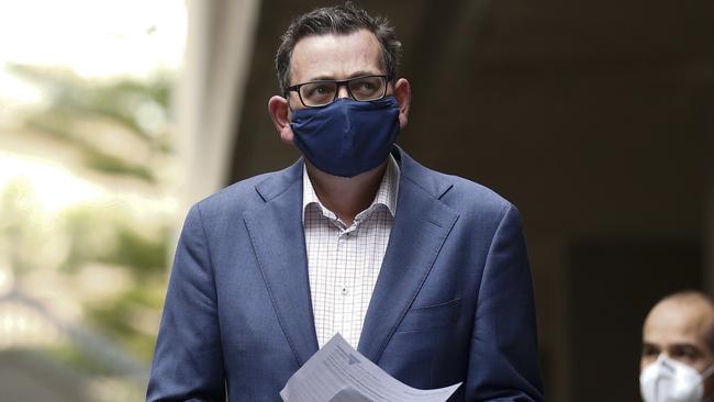 Daniel Andrews masks up before addressing the media in Melbourne on Victoria’s latest COVID numbers. Picture: Daniel Pockett