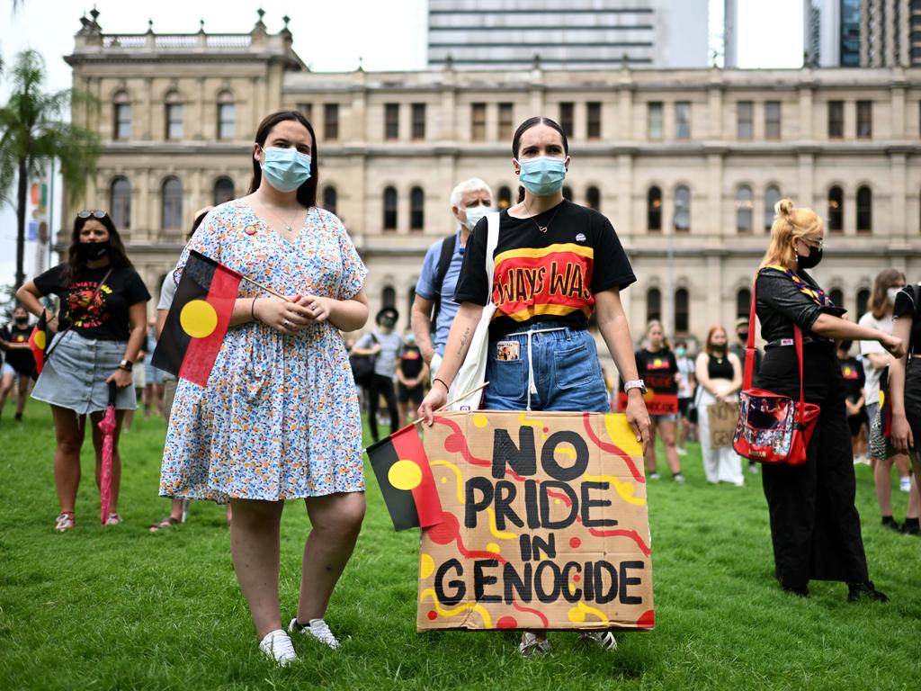 People take part in an Invasion Day protest in central Brisbane on Australia Day. Picture: NCA NewsWire / Dan Peled