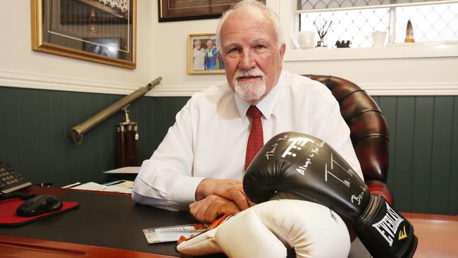 Criminal Lawyer Chris Hannay in his Southport chambers with some boxing memorabilia. Picture: Glenn Hampson