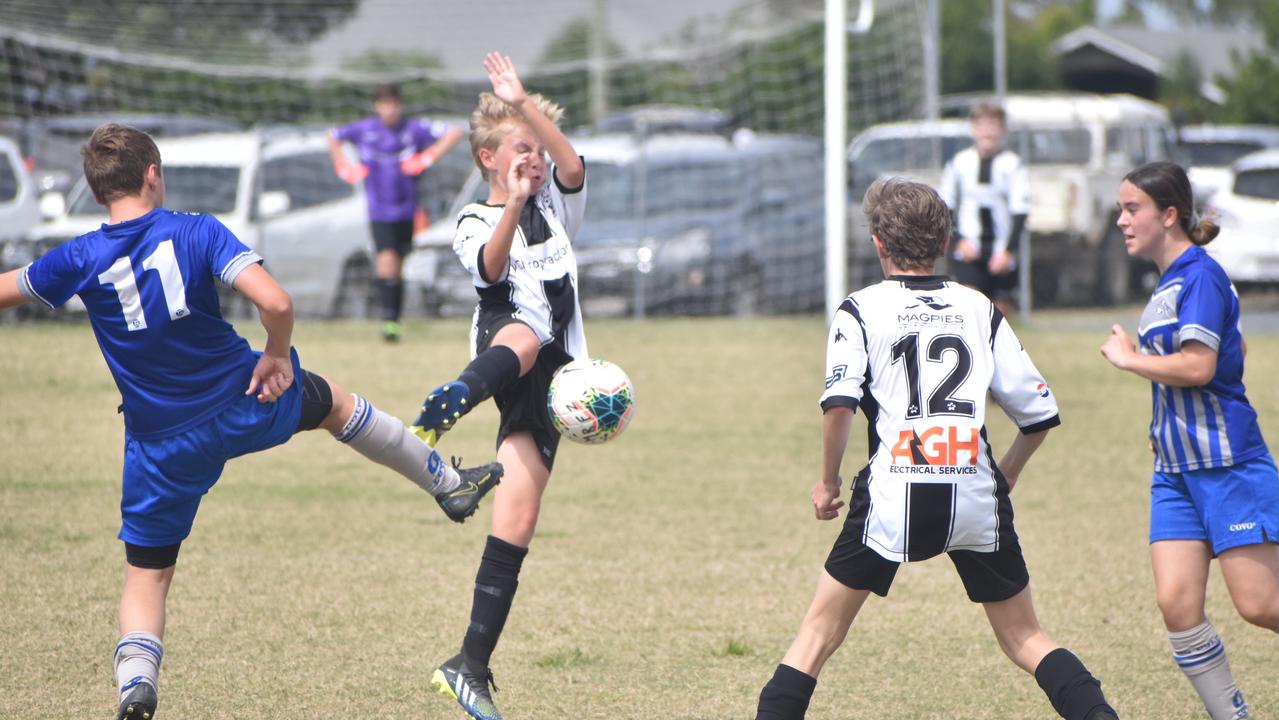 Khye Tuckerman (left) and Lachlan Russell in the Dolphins and Magpies clash at Mackay Football Park, August 21, 2021. Picture: Matthew Forrest