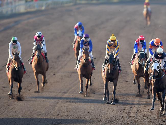 The Carlton Mid Darwin Cup (2000m) finish with winner, Gary Clarke trained Zahspeed riden by B.Davis.Picture by Patrina Malone