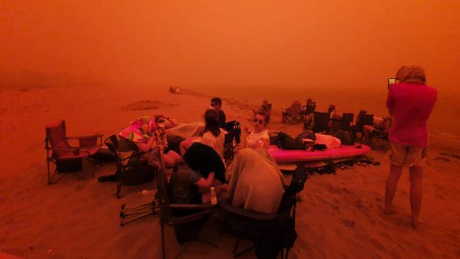 People gather at an evacuation centre at Batemans Bay. Picture: Twitter/alastairprior