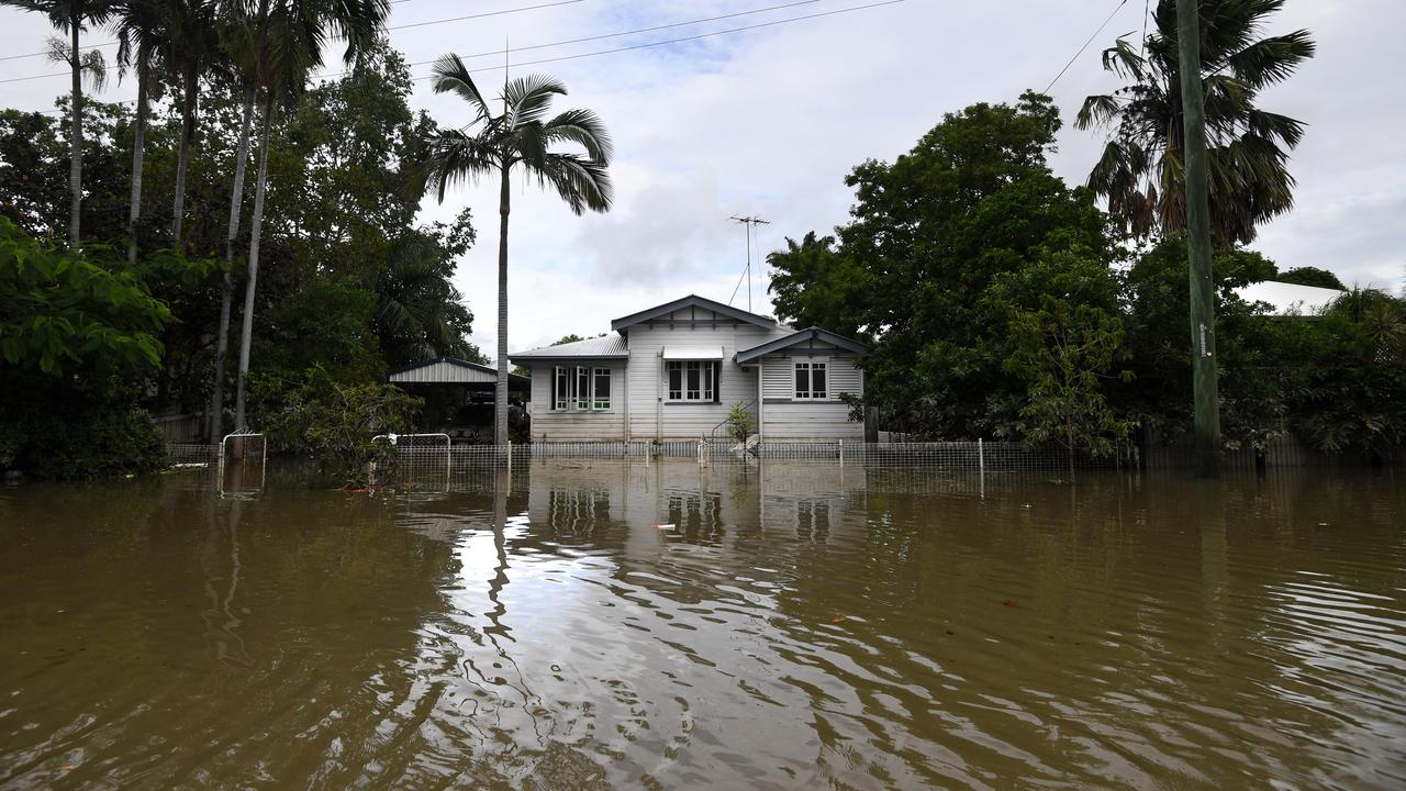 A house surrounded by flood water in Townsville’s Hermit Park in 2019’s floods. Picture: AAP Image/Dan Peled.