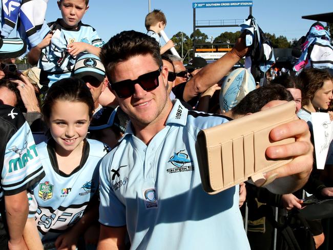 Chad Townsend gets a selfie with a young fan during a NRL fan Day at Southern Cross Group Stadium. Picture: Gregg Porteous