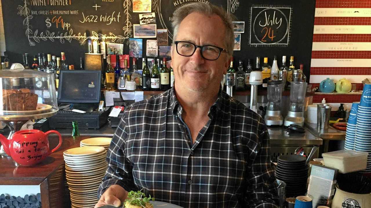 WINTER MENU: Fratellini's owner Andrew Powell with two dishes from the new winter menu. Picture: Michele Sternberg