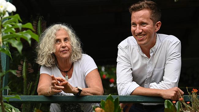 Max Chandler-Mather speaks to local Liz Logan in Holland Park while doorknocking. Picture: Lyndon Mechielsen/The Australian