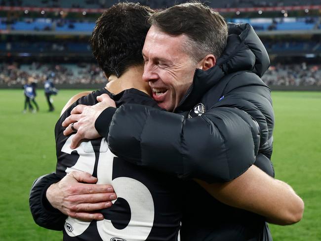 MELBOURNE, AUSTRALIA - AUGUST 17: Nick Daicos (left) and Craig McRae, Senior Coach of the Magpies celebrate during the 2024 AFL Round 23 match between the Collingwood Magpies and the Brisbane Lions at The Melbourne Cricket Ground on August 17, 2024 in Melbourne, Australia. (Photo by Michael Willson/AFL Photos via Getty Images)