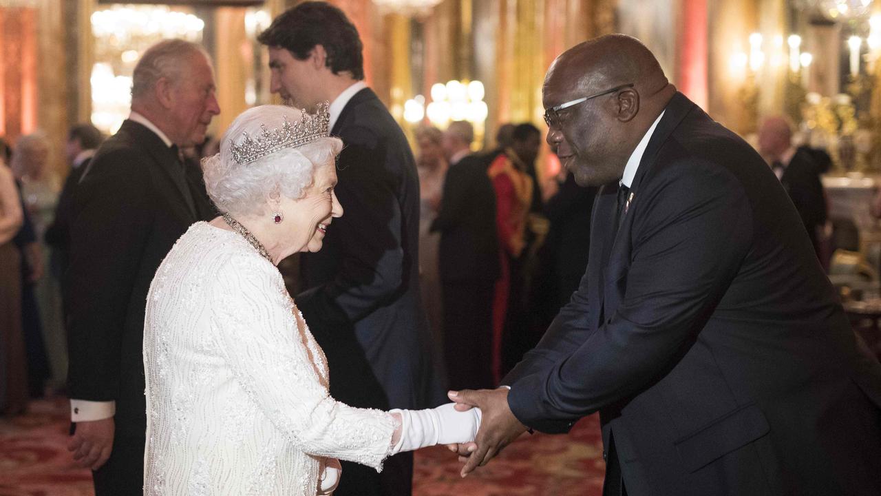 Queen Elizabeth greets former Saint Kitts and Nevis PM Timothy Harris. Picture: Victoria Jones/AFP