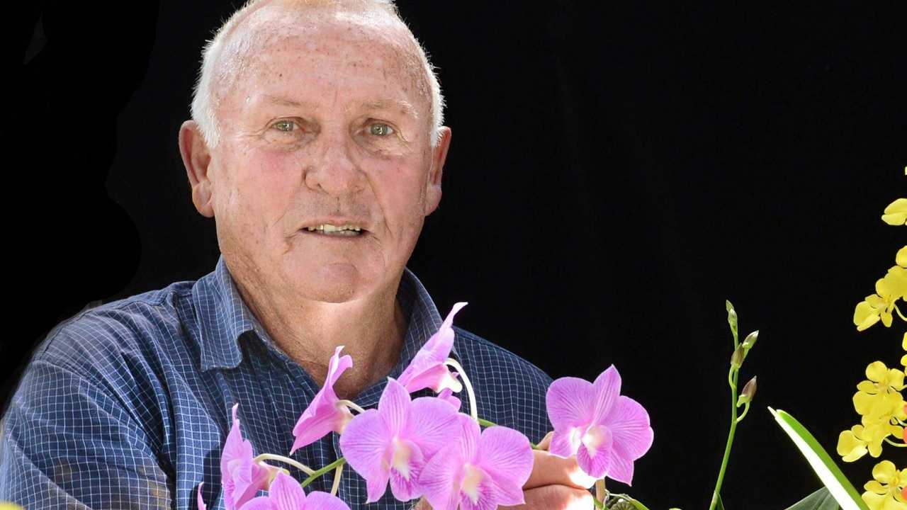 Athol Lavis of Goonellabah with some of his prize-winning orchids. Photo Cathy Adams / The Northern Star. Picture: Cathy Adams