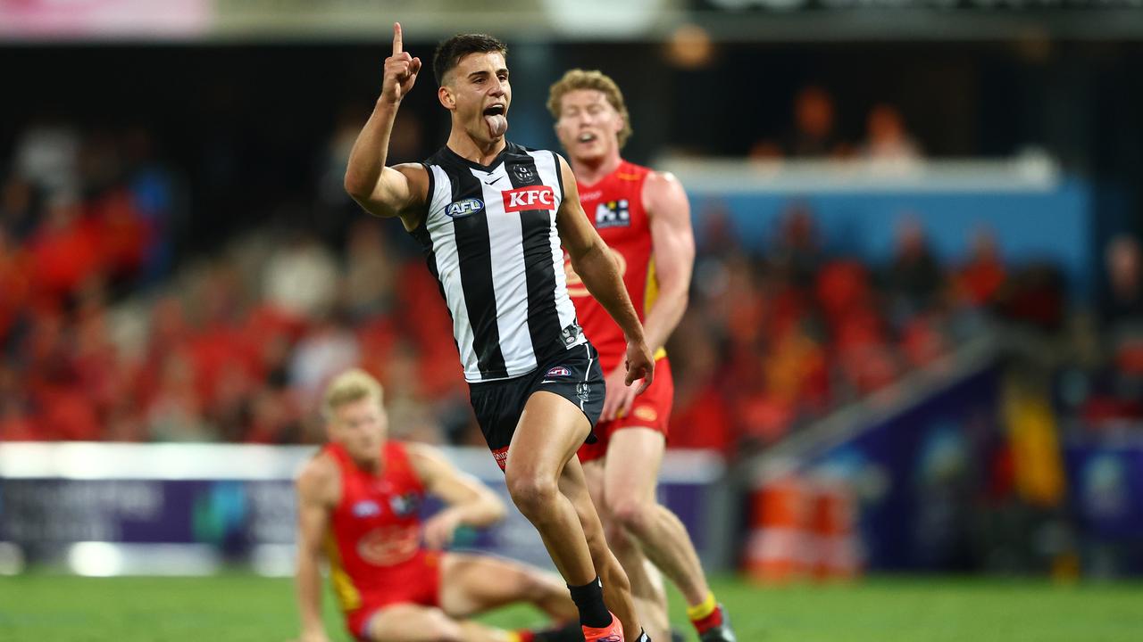 Nick Daicos celebrates a goal on the Gold Coast this year.