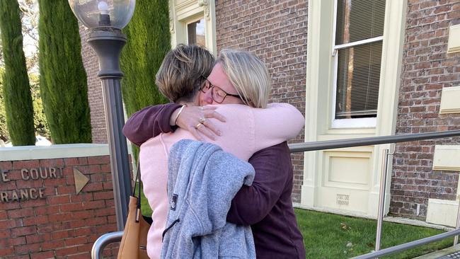 Claudette Brettner hugging supporter after verdict. Picture: Rosemary Murphy