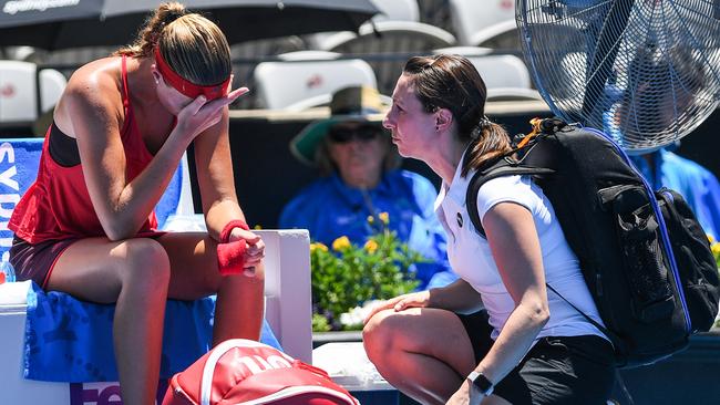 Kristina Mladenovic retires early from her match against Ellen Perez.