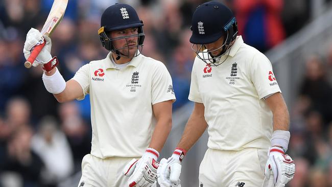 Rory Burns and Joe Root on day three. Picture: Getty Images