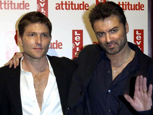 Singer George Michael (R) and his then partner Kenny Goss in 2004. Picture: Supplied