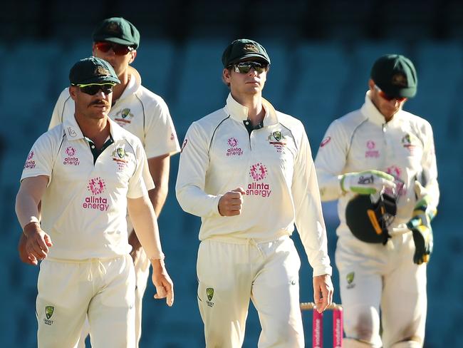 SYDNEY, AUSTRALIA - JANUARY 11: The Australia players shakle hands with Hanuma Vihari and Ravichandran Ashwin of India after a draw during day five of the Third Test match in the series between Australia and India at Sydney Cricket Ground on January 11, 2021 in Sydney, Australia. (Photo by Mark Kolbe/Getty Images)