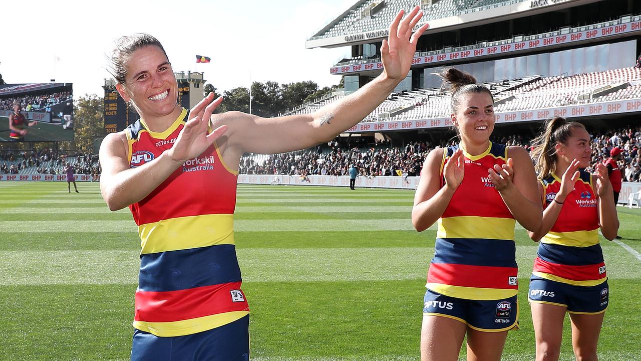 Chelsea Randall waves to fans after their preliminary final win over Brisbane. Picture: Sarah Reed/AFL Photos/Getty Images