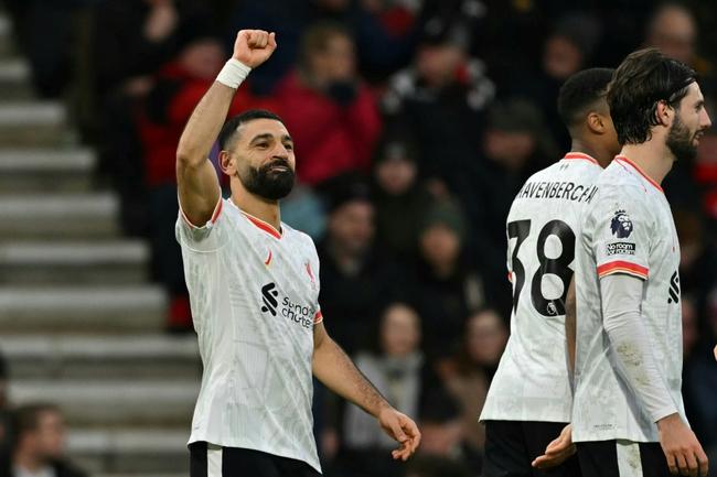 Mohamed Salah (left)scored twice in Liverpool's 2-0 win at Bournemouth