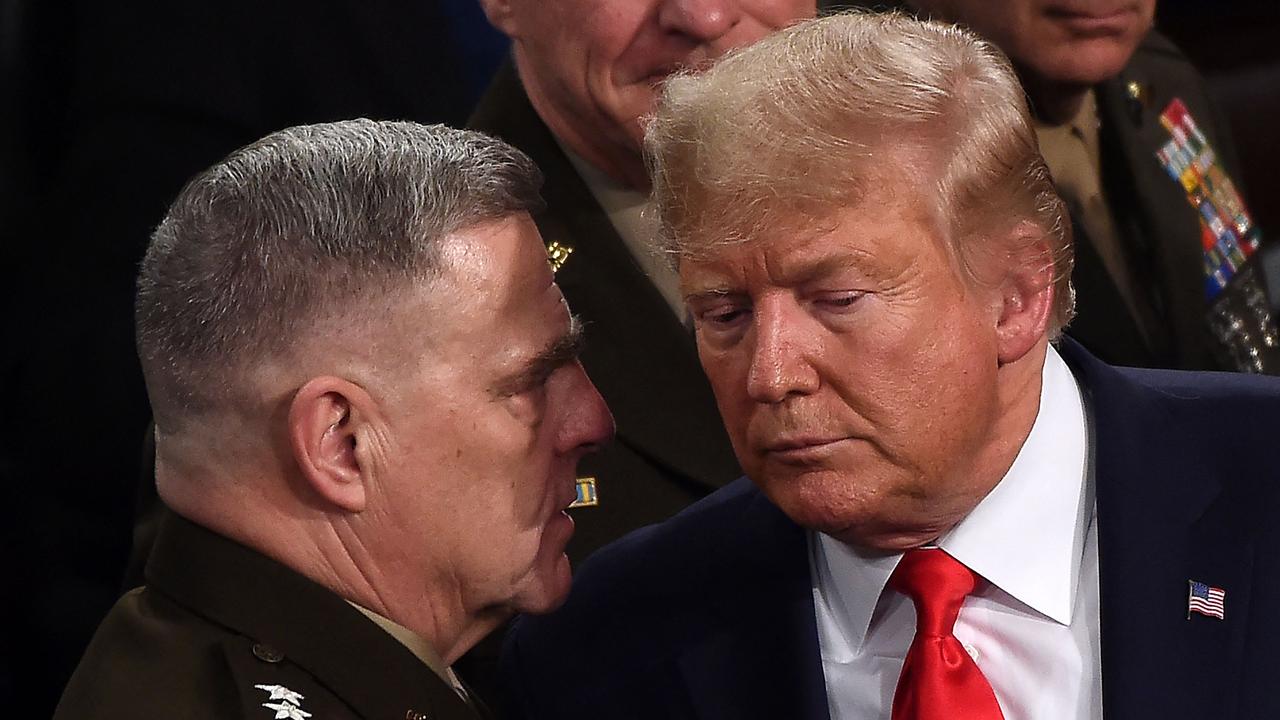 In this file photo taken in February 2020, Chairman of the Joint Chiefs of Staff, Army General Mark Milley chats with US President Donald Trump after he delivered the State of the Union address at the US Capitol in Washington, DC. Picture: Olivier Douliery/AFP