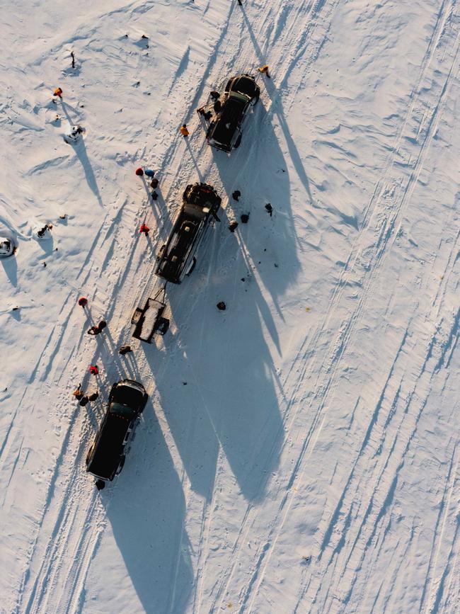 A convoy out on the ice.