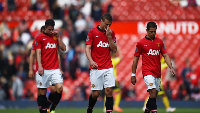 (L-R) Robin van Persie, Nemanja Vidic and Javier Hernandez.