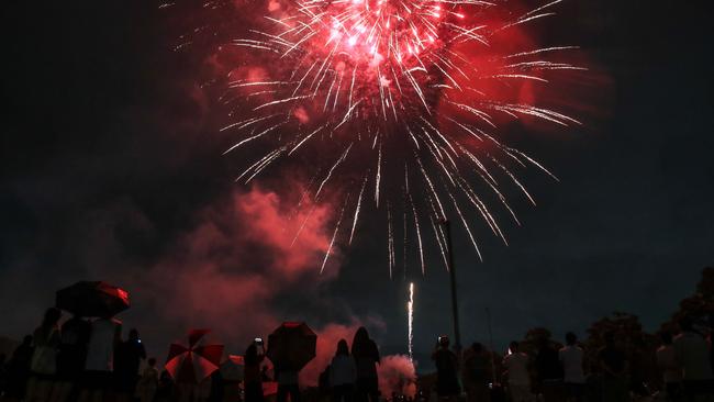 Fireworks light up the night on Australia Day at Adams Park in western Sydney. Picture: Getty Images