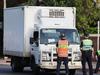 Truck driver arrested after hitting teens
