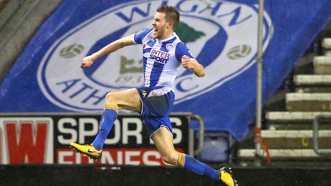 Callum Elder of Wigan Athletic celebrates after scoring in the Third Round FA Cup win over Bournemouth.
