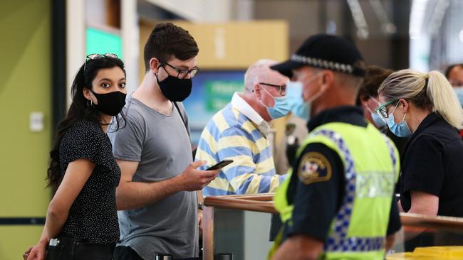 The first passengers from Melbourne arrive at Hobart airport after the borders reopened to Victoria last week. Picture: Zak Simmonds