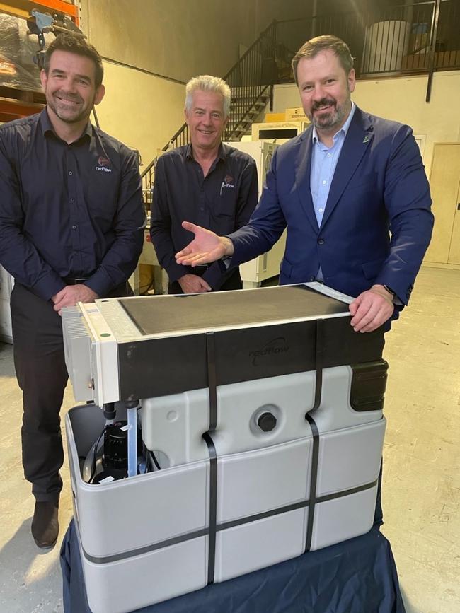 MP Ed Husic (right) visiting Redflow in 2023, with Redlfow CEO Tim Harris (left) and chief technology officer Steve Hickey (middle). Photo: Supplied