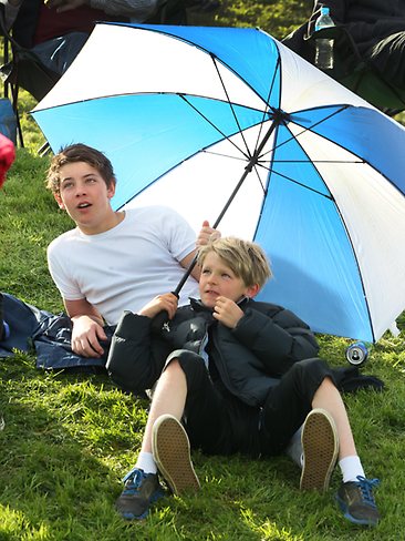 <p>Spectators Hugh McKay, 13, of Cambridge and Oscar Pritchard, 8, of Mt Stuart. Picture: Kim Eiszele</p>