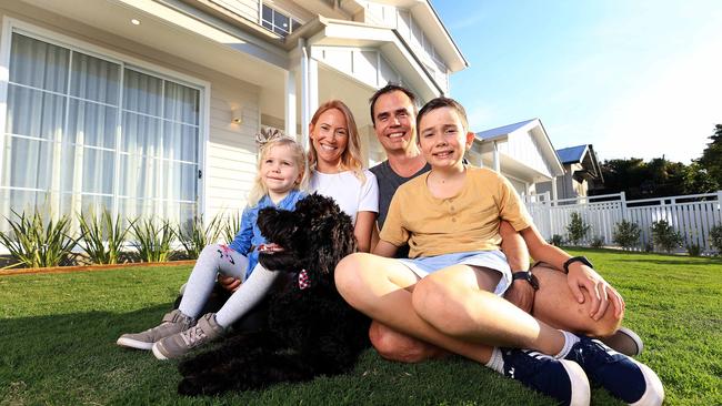 Tarah Hastie, husband Adam and their children Chester, 10, and Valerie, 3, are taking their Enoggera home to auction this weekend. Picture: Adam Head