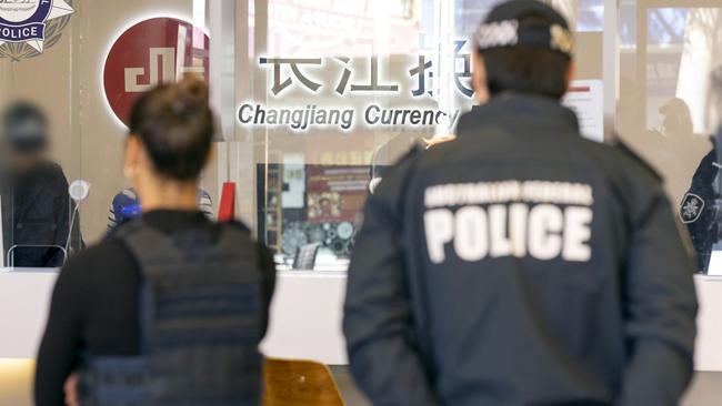 Search warrant at Changjiang Currency Exchange in Sydney CBD conducted as part of Operation Avarus-Nightwolf.