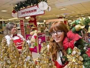 GIFTS GALORE: ( From left ) Myer gifticians Leonie Slingsby and Bek Hunter wish to help customers with christmas shopping. Tuesday, Dec 2, 2014 . Photo Nev Madsen / The Chronicle. Picture: Nev Madsen