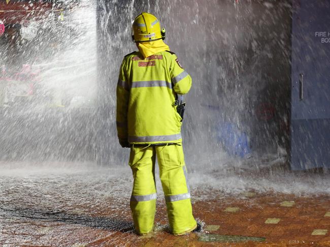 Burst Water Main Beaufort St and Sixth Ave Inglewood in two story apartment building with commercial units on ground floor. Fire truck attended, Photo Bohdan Warchomij Flood. Flooding.