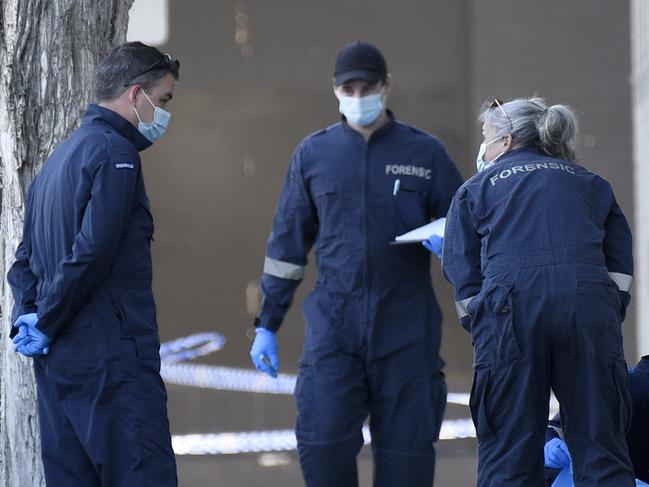 Forensic police at the scene the morning after the shooting. Picture: Andrew Henshaw