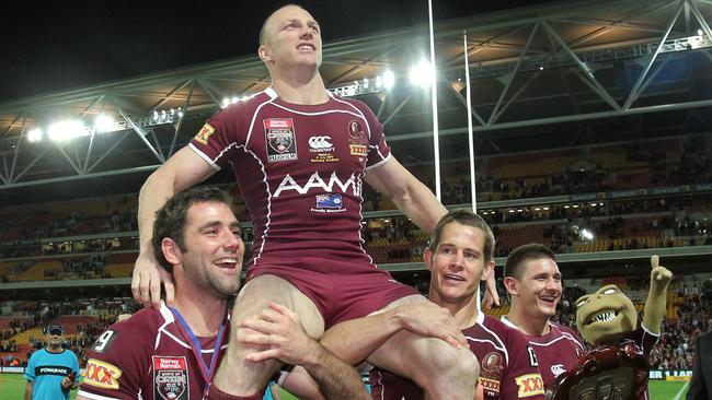 Darren Lockyer is chaired off by Cameron Smith and Ashley Harrison after his final Origin.